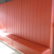 high back banquette with vertical channels